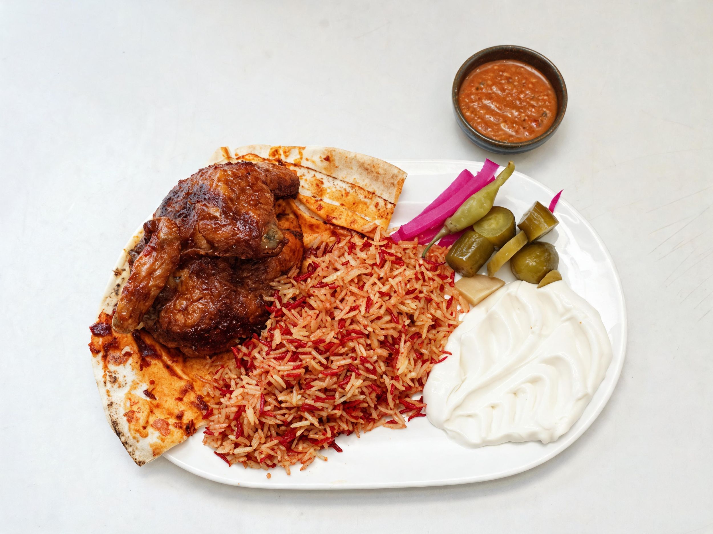 Halbes Hähnchen mit Reis